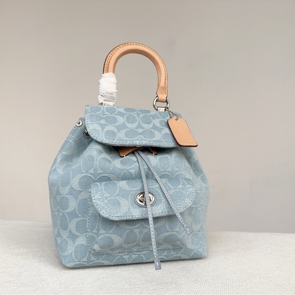 Coach Handbags - Coach Blue Denim Signature Canvas Backpack